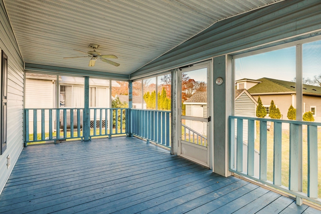 18 Mockingbird Lane Tiverton, RI 02878 - Photo 22 of 32 a view of an empty room with wooden floor and a window