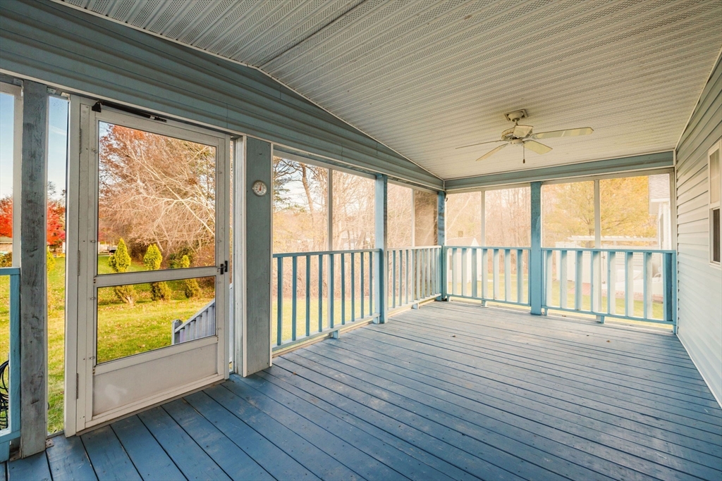 18 Mockingbird Lane Tiverton, RI 02878 - Photo 23 of 32 a view of an empty room with wooden floor and a window
