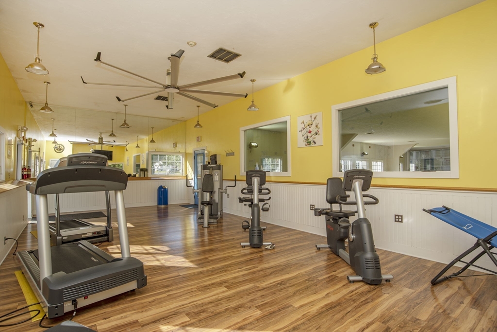 18 Mockingbird Lane Tiverton, RI 02878 - Photo 30 of 32 a view of a room with gym equipment