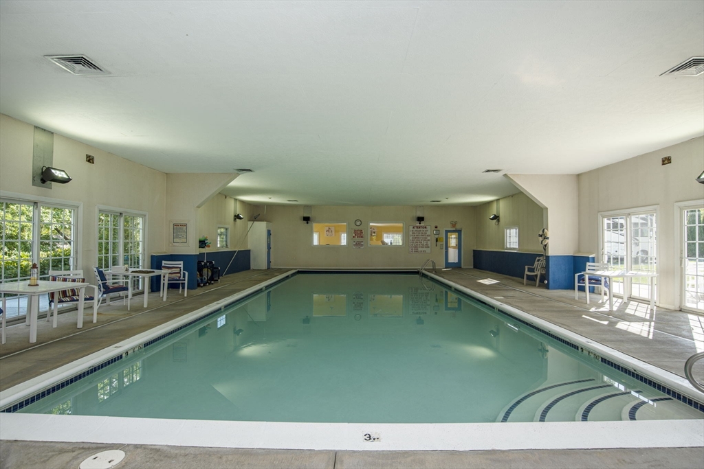 18 Mockingbird Lane Tiverton, RI 02878 - Photo 31 of 32 a view of a pool table chairs