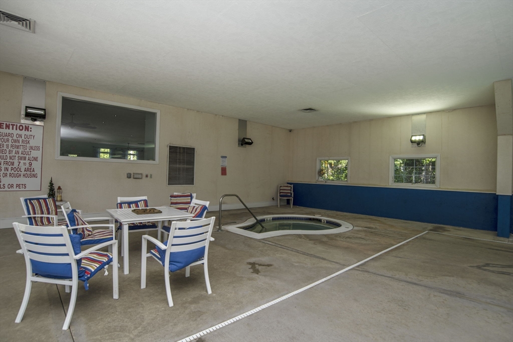 18 Mockingbird Lane Tiverton, RI 02878 - Photo 32 of 32 a view of a dining room with furniture