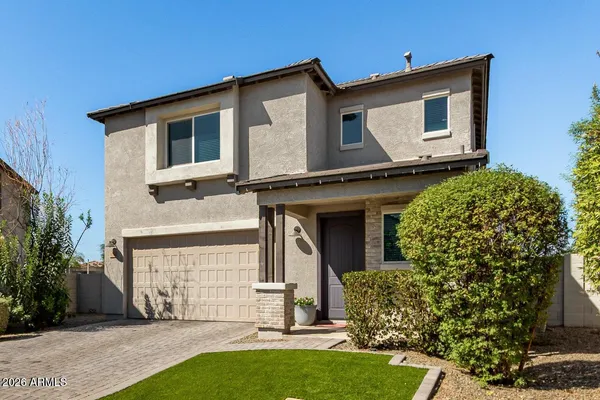 a house view with a garden space