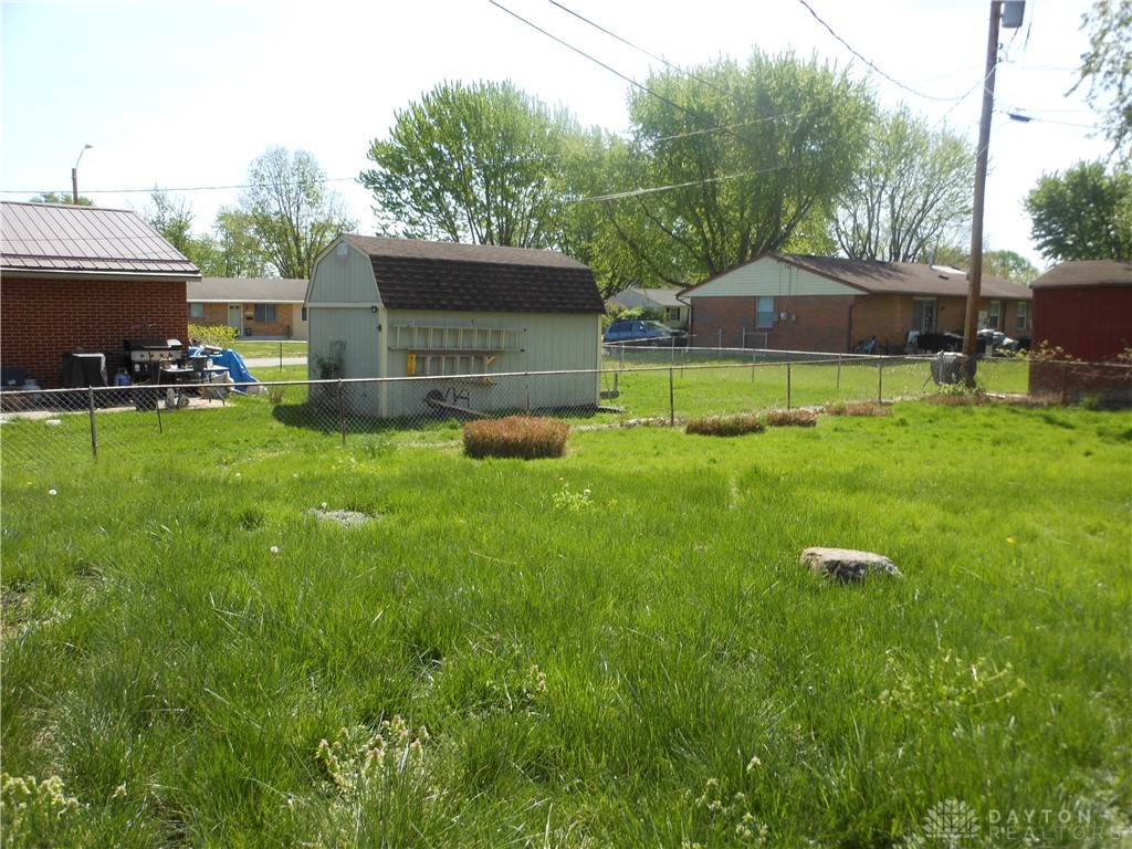 143 West Emerick Road West Milton, OH 45383 - Photo 32 of 37 This spacious yard offers ample outdoor potential for various activities.