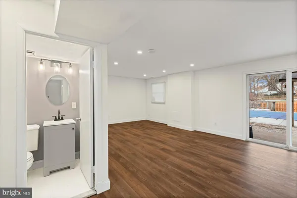a bathroom with a shower and a toilet
