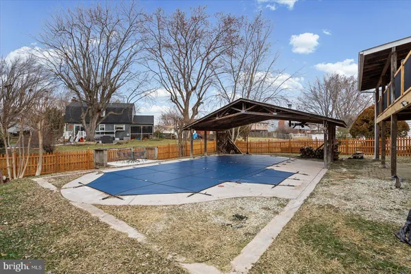 a view of a house with a swimming pool