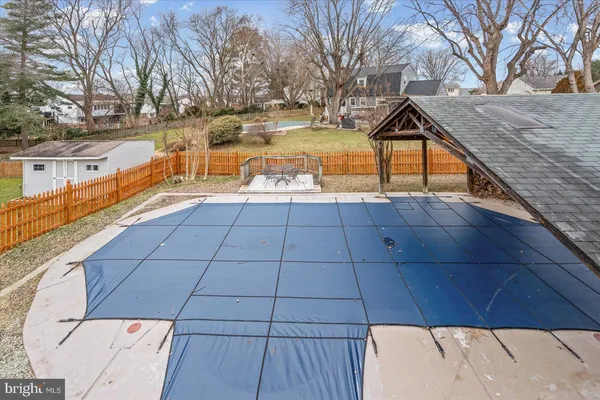 a view of a house with pool on roof deck