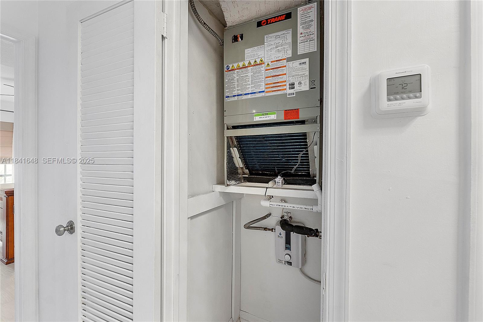 2180 Northeast 67th Street, Unit 728 Fort Lauderdale, FL 33308 - Photo 18 of 49 a view of storage and utility