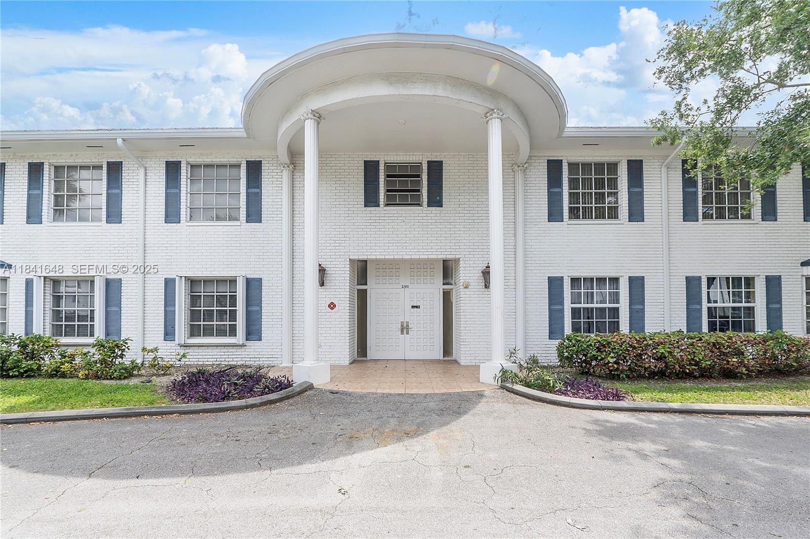 2180 Northeast 67th Street, Unit 728 Fort Lauderdale, FL 33308 - Photo 23 of 49 a front view of a house