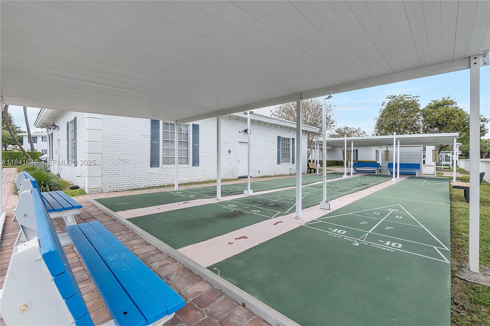 2180 Northeast 67th Street, Unit 728 Fort Lauderdale, FL 33308 - Photo 39 of 49 a view of a house with backyard