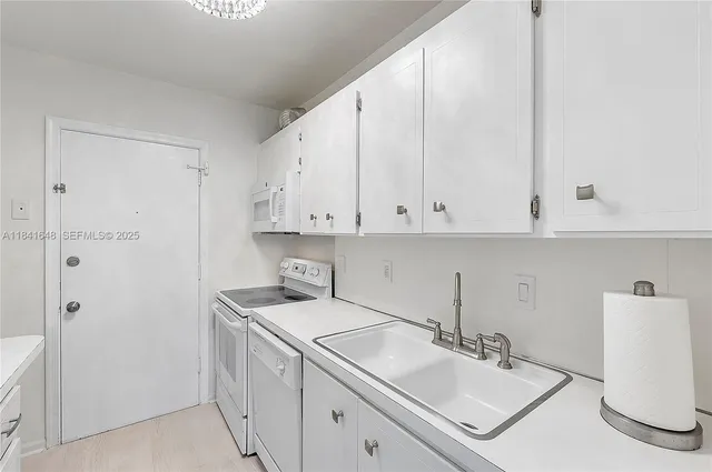 a view of bathroom with dual sinks