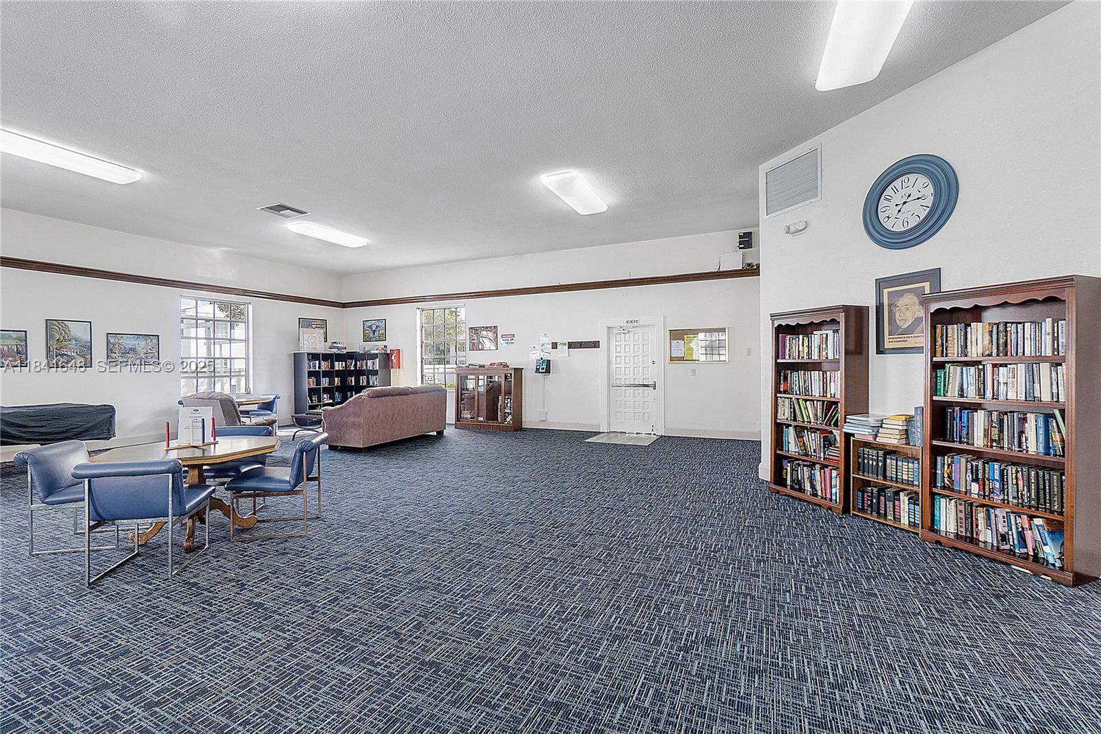 2180 Northeast 67th Street, Unit 728 Fort Lauderdale, FL 33308 - Photo 47 of 49 a living room with furniture and a window