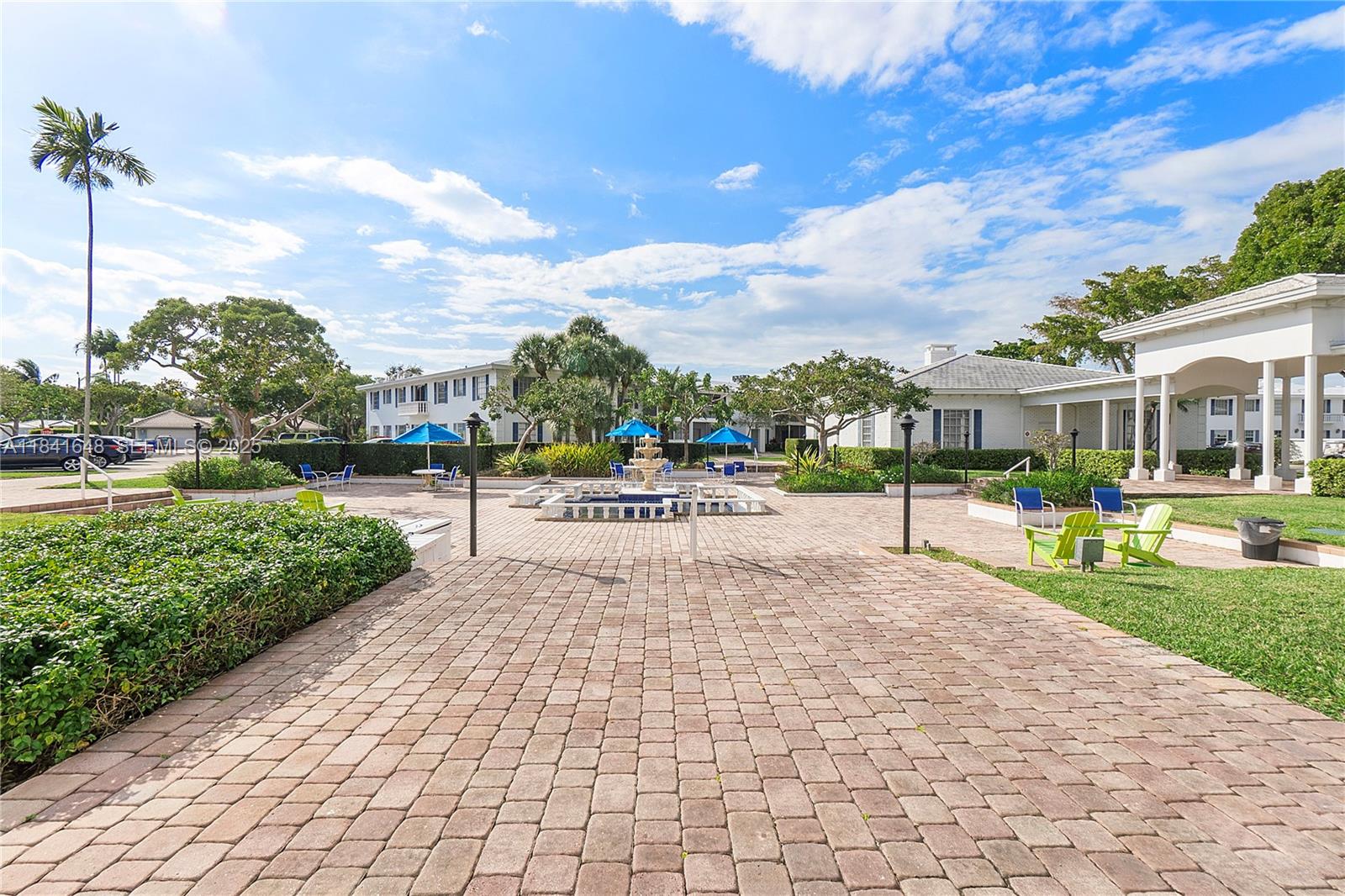 2180 Northeast 67th Street, Unit 728 Fort Lauderdale, FL 33308 - Photo 48 of 49 a park with lots of green space and bench