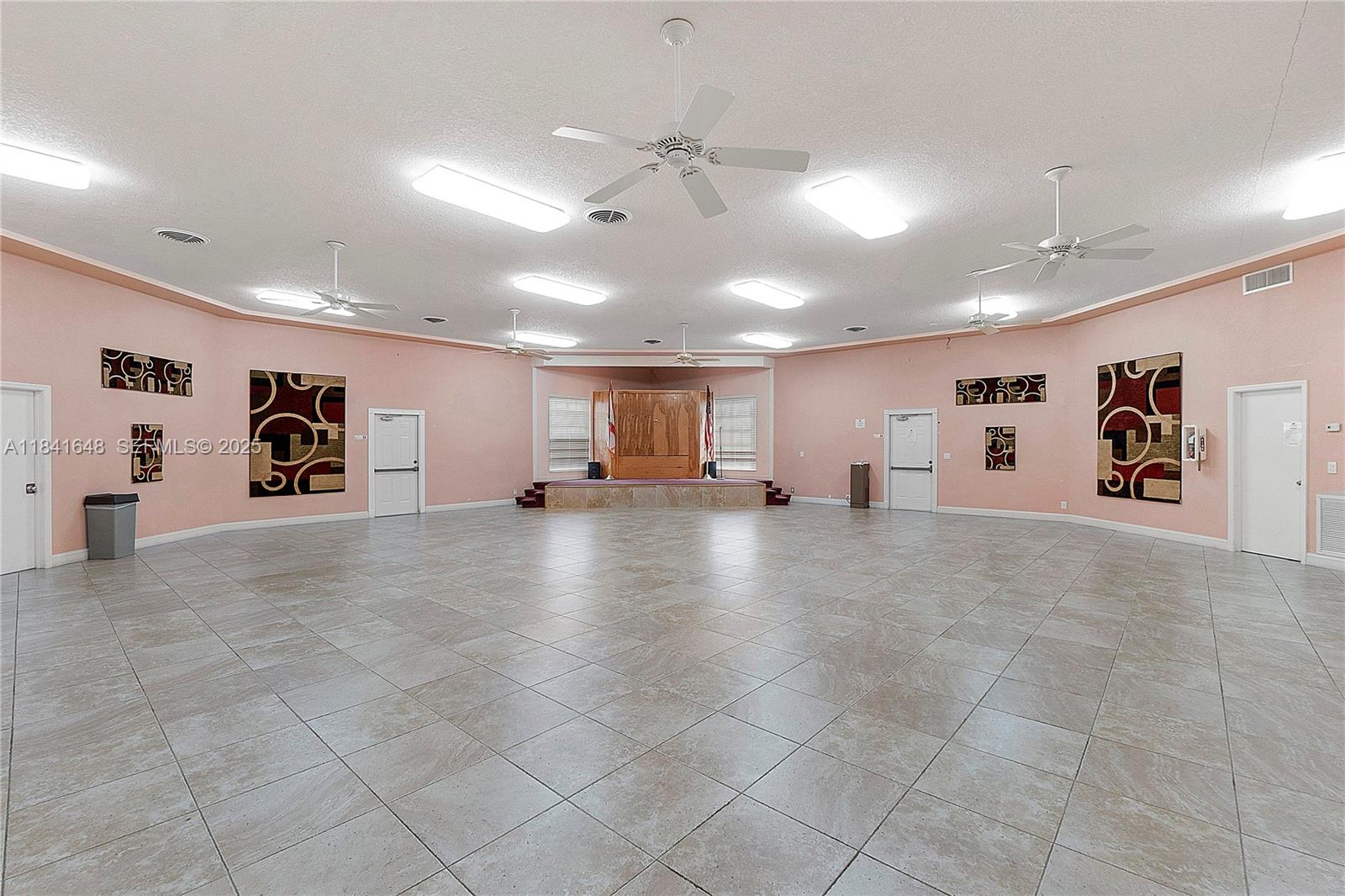 2180 Northeast 67th Street, Unit 728 Fort Lauderdale, FL 33308 - Photo 49 of 49 a view of a livingroom with furniture and a ceiling fan