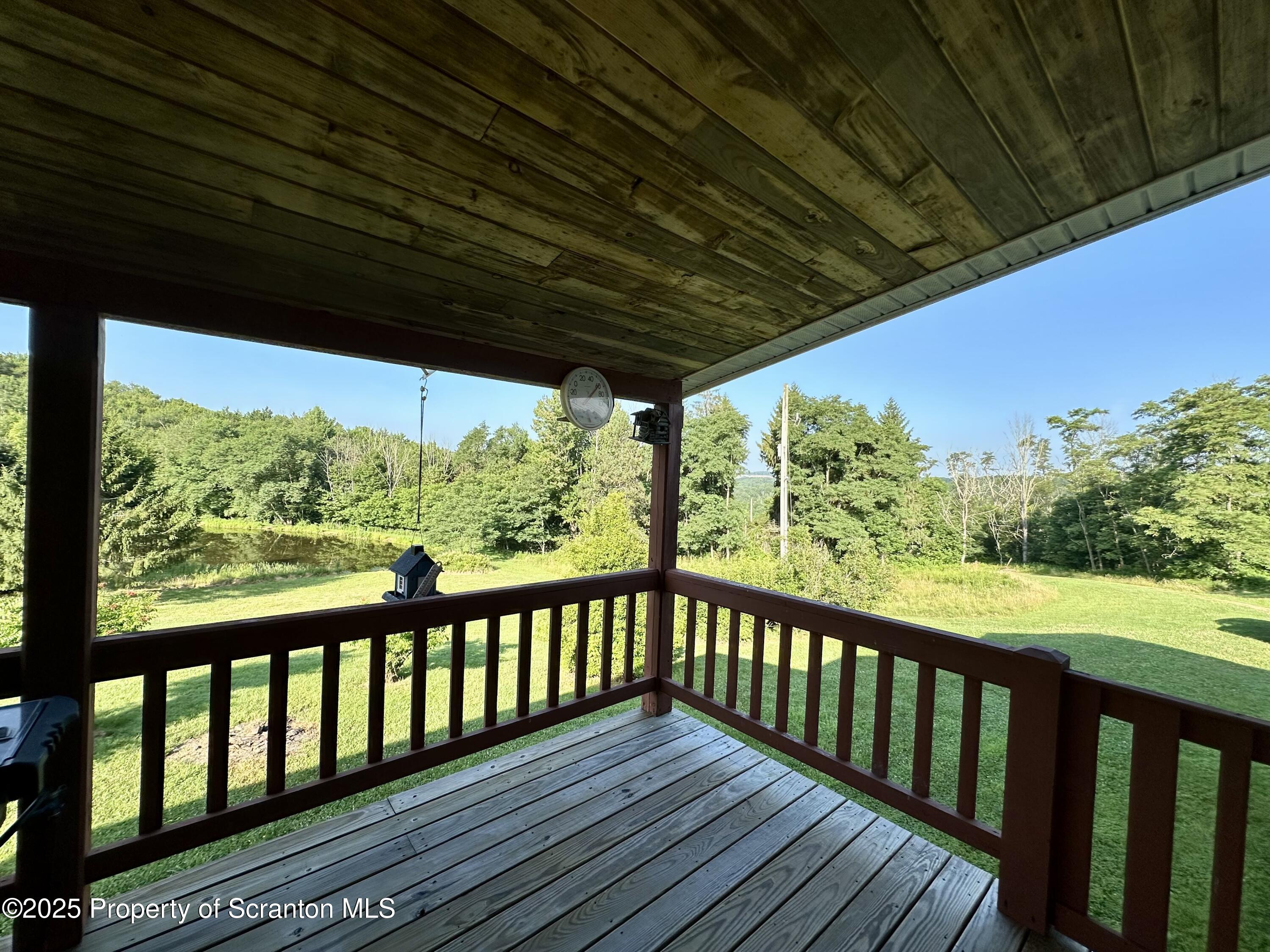 5290 Irish Hill Road Montrose, PA 18801 - Photo 36 of 62 Covered Deck