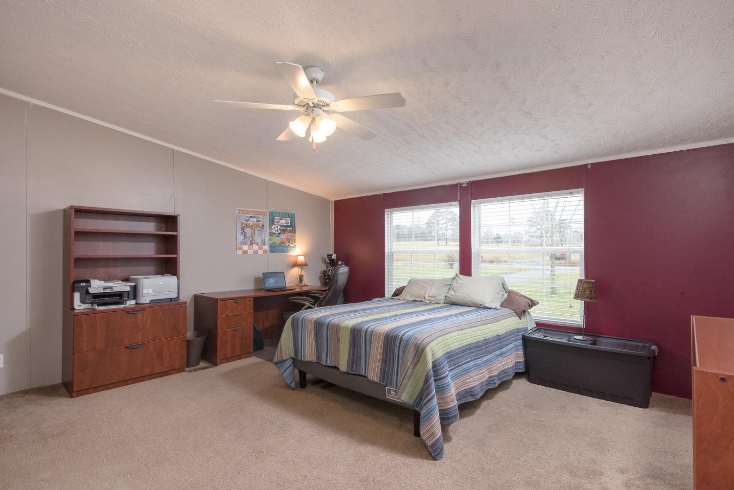 929 Hunt Road Cleveland, TN 37323 - Photo 12 of 26 a bedroom with a bed dresser and window