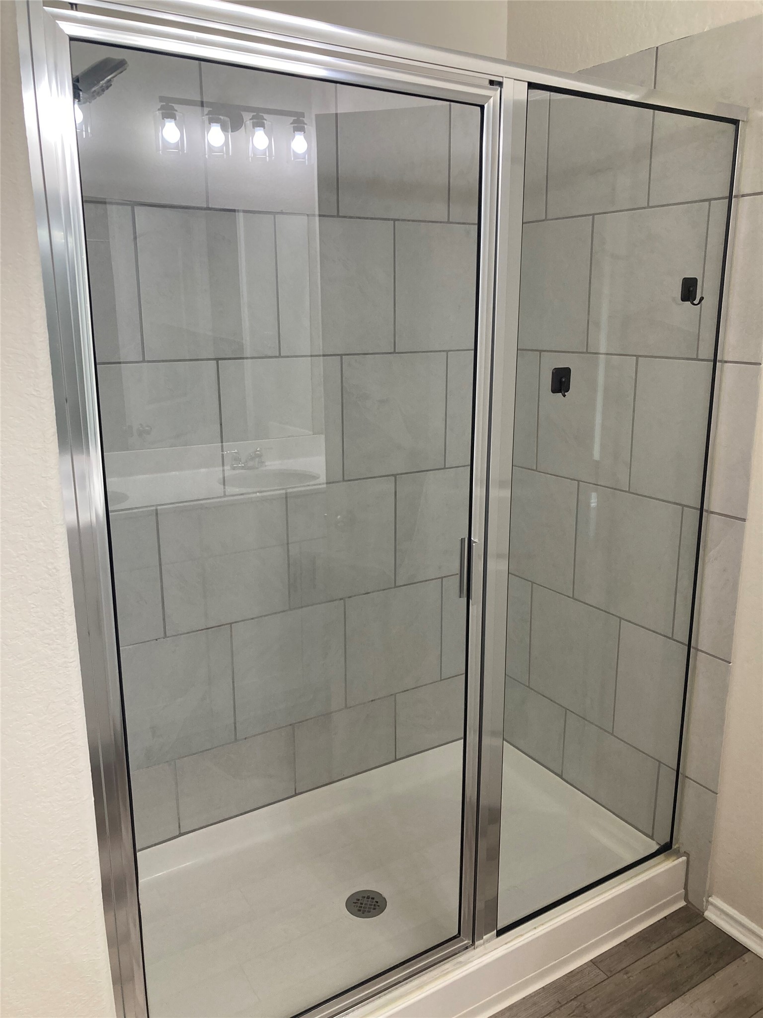 137 Onna Street Taylor, TX 76574 - Photo 8 of 13 Primary Bathroom Shower