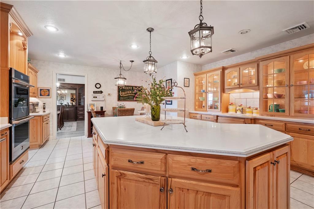 620 North Franklin Avenue Somerset, PA 15501 - Photo 12 of 37 a view of a kitchen with kitchen island a counter top space a sink appliances and cabinets