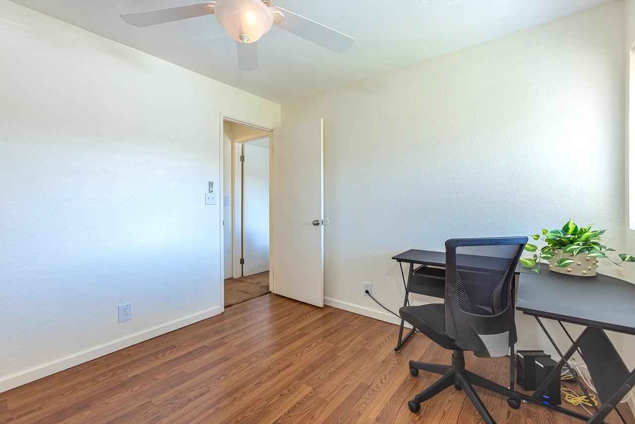 140 Uwapo Road, Unit 55205 Kihei, HI 96753 - Photo 18 of 31 a view of a workspace with furniture and wooden floor