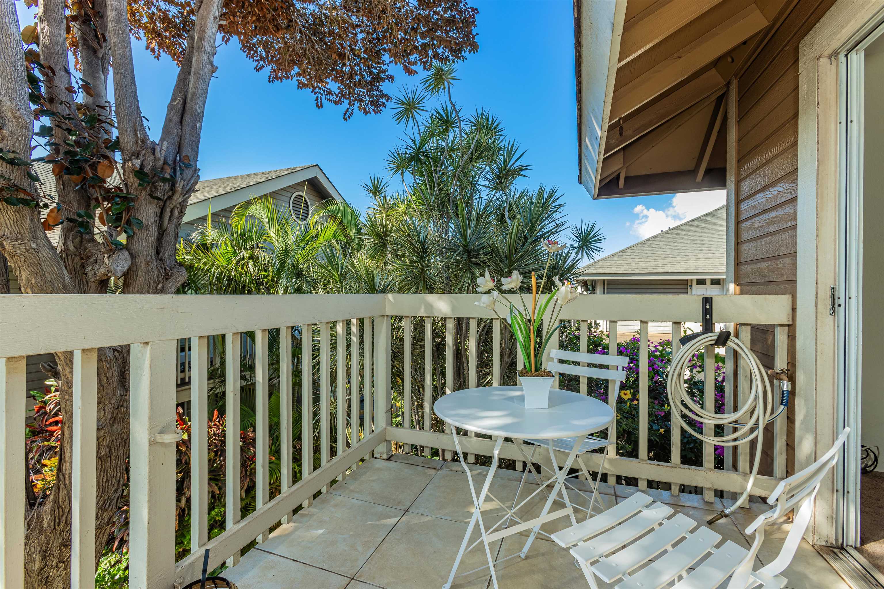 140 Uwapo Road, Unit 55205 Kihei, HI 96753 - Photo 26 of 31 a view of a chairs and table in the balcony