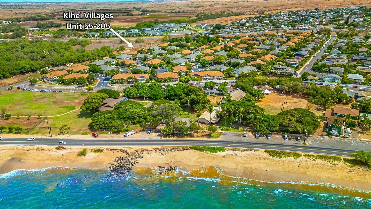 140 Uwapo Road, Unit 55205 Kihei, HI 96753 - Photo 3 of 31 a view of a swimming pool and an outdoor space