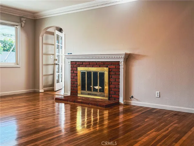 a view of a livingroom with wooden floor