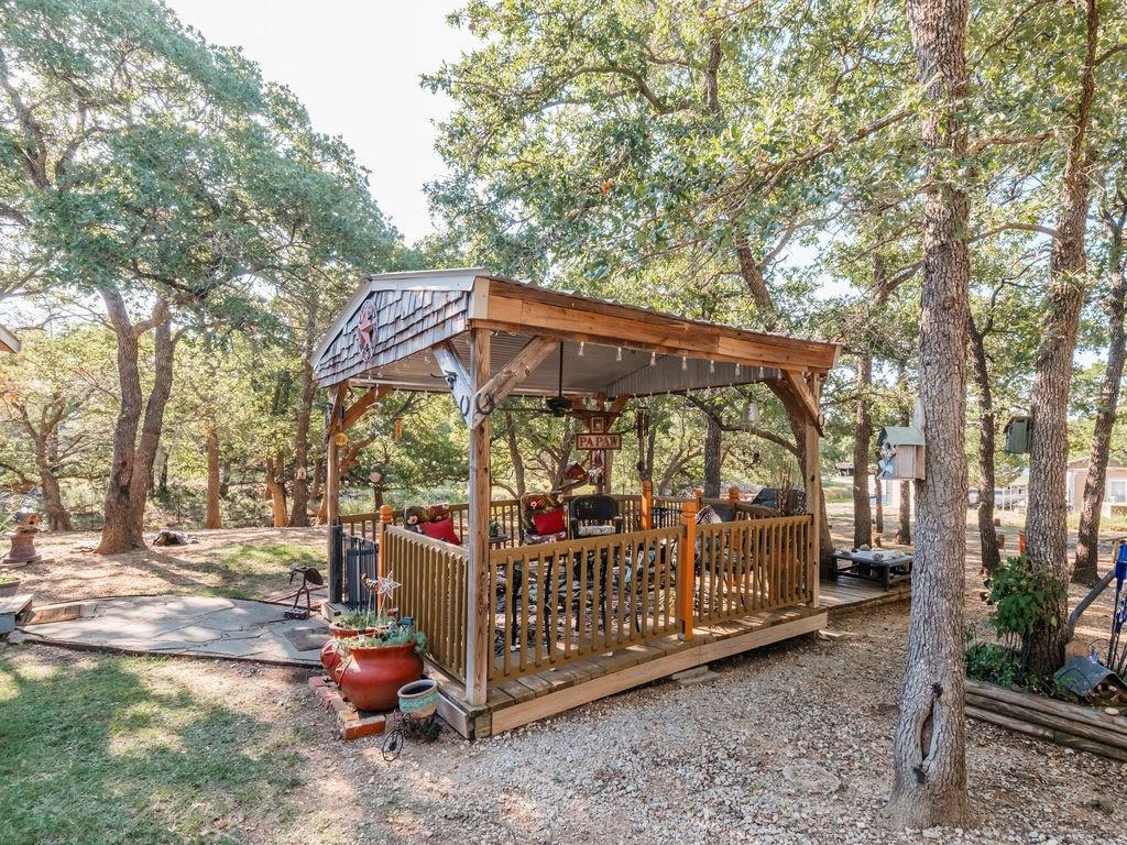 196 Perch Road Bowie, TX 76230 - Photo 29 of 33 a view of outdoor space with entertaining tree