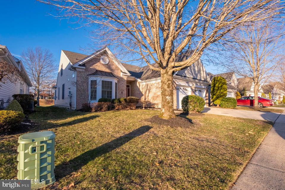 110 Wild Dunes Way Jackson, NJ 08527 - Photo 2 of 82 a large tree in front of a house