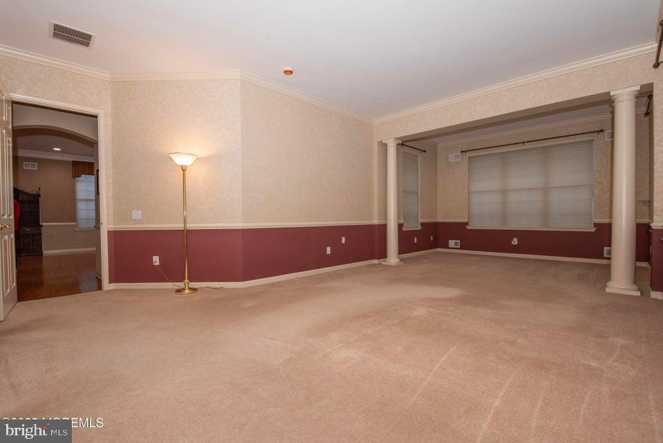 110 Wild Dunes Way Jackson, NJ 08527 - Photo 51 of 82 a view of an empty room with a fireplace