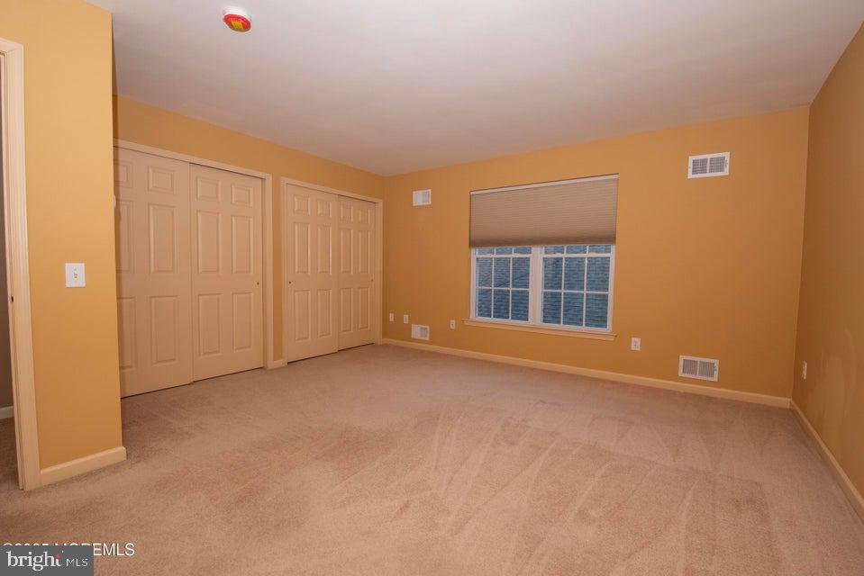 110 Wild Dunes Way Jackson, NJ 08527 - Photo 56 of 82 an empty room with windows