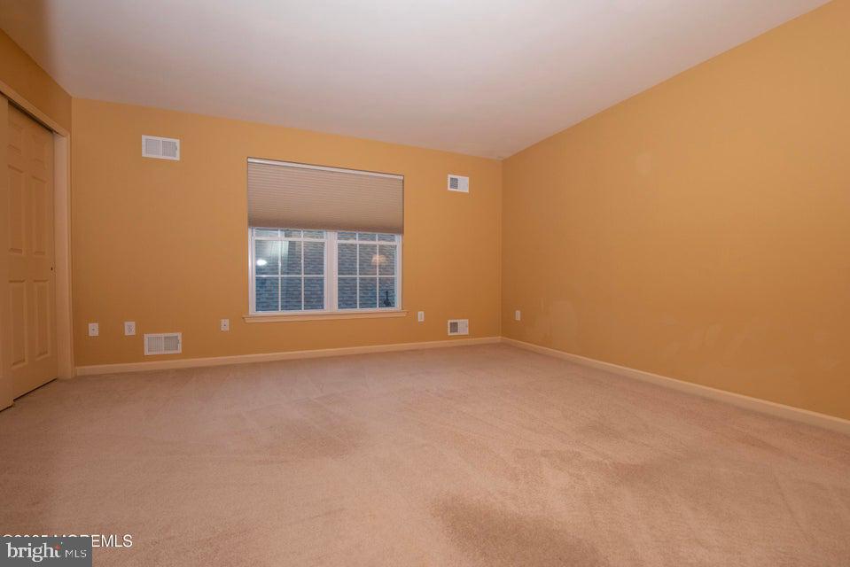 110 Wild Dunes Way Jackson, NJ 08527 - Photo 59 of 82 an empty room with a window