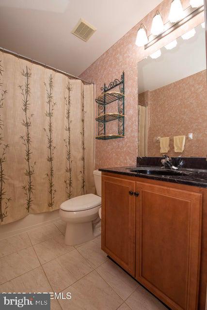 110 Wild Dunes Way Jackson, NJ 08527 - Photo 60 of 82 a bathroom with a toilet a sink and shower