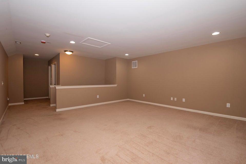 110 Wild Dunes Way Jackson, NJ 08527 - Photo 64 of 82 an empty room with a empty space and windows