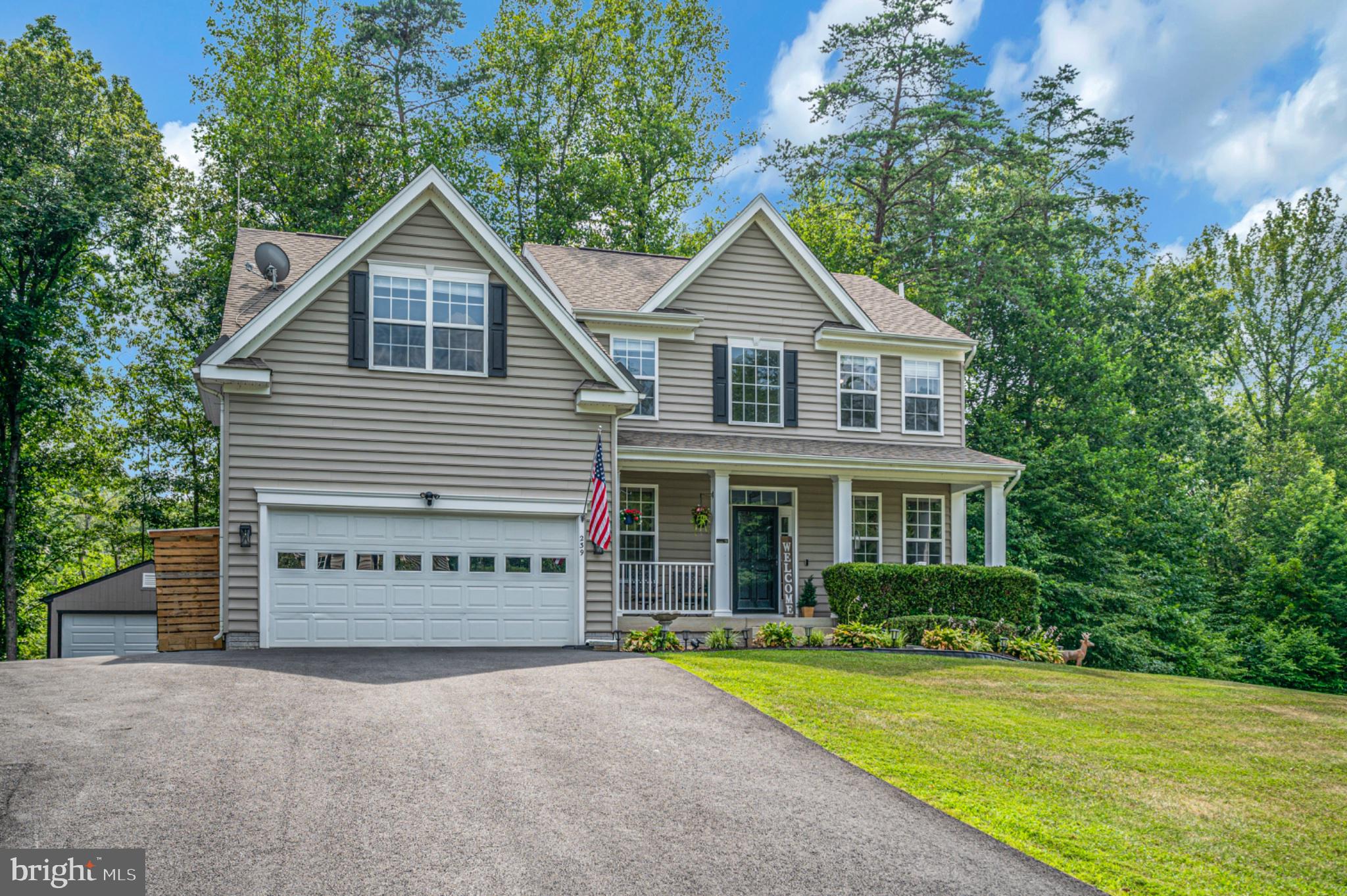 239 Toluca Road Stafford, VA 22556 - Photo 11 of 75 Charming home nestled in lush greenery.