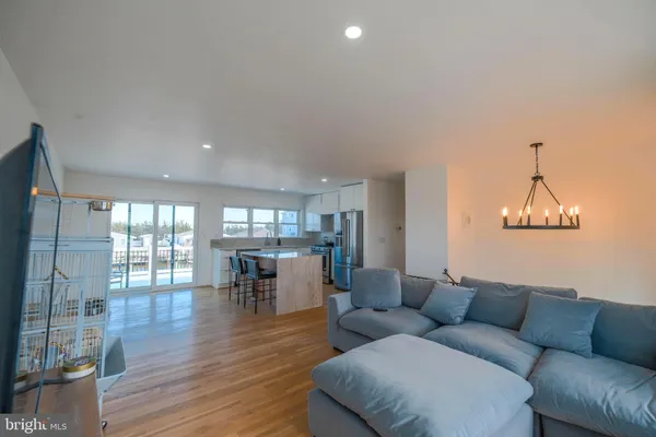 a view of a livingroom with furniture and windows