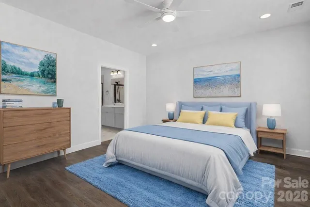 a bedroom with a bed and a dresser