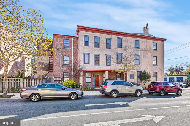 a car parked in front of a building