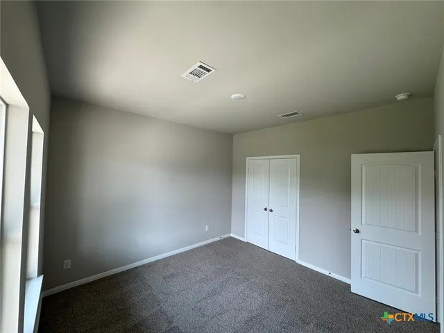 an empty room with window