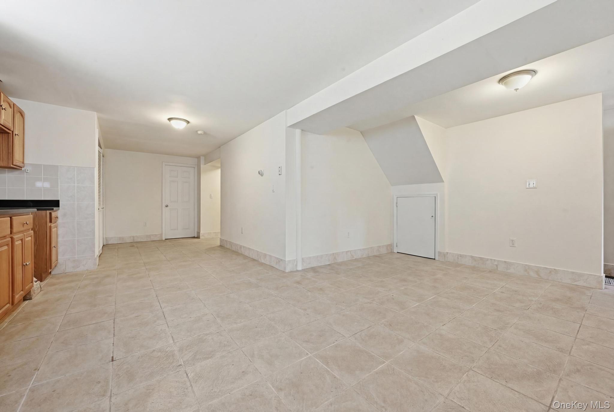 61-16 161 Street Queens, NY 11365 - Photo 18 of 22 a view of an empty room