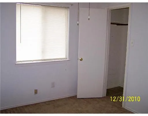 a view of a window in an empty room