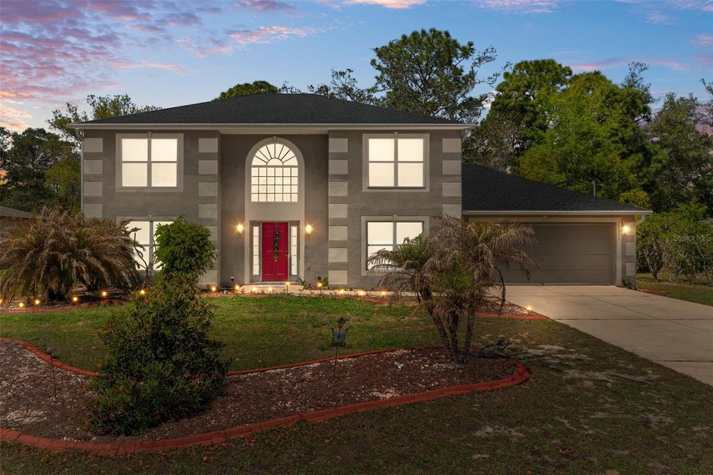 10331 Dunkirk Road Spring Hill, FL 34608 - Photo 1 of 42 front view of a house