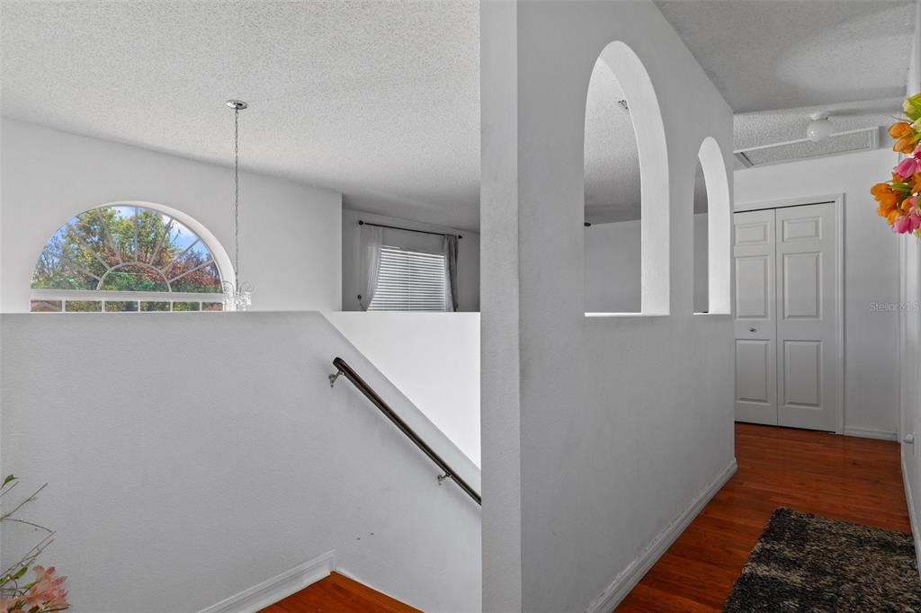 10331 Dunkirk Road Spring Hill, FL 34608 - Photo 25 of 42 a view of a livingroom with wooden floor and a window