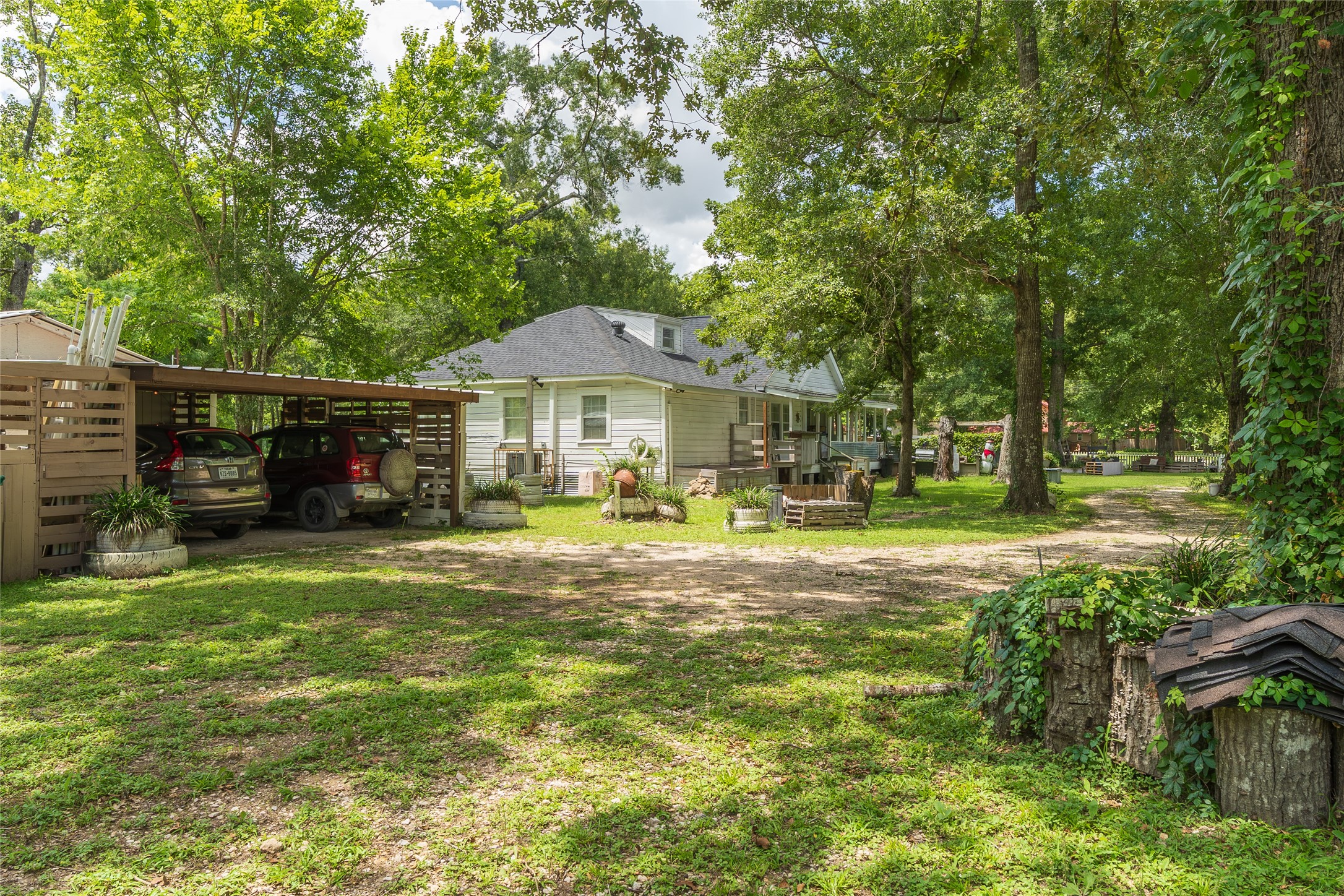 2118 Rolling Hills Road Conroe, TX 77303 - Photo 35 of 39 Generous green space offers privacy, flexibility, and room to roam.