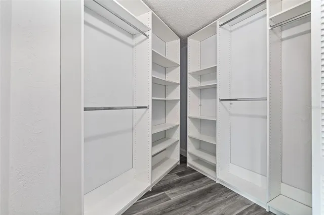a view of an empty walk in closet