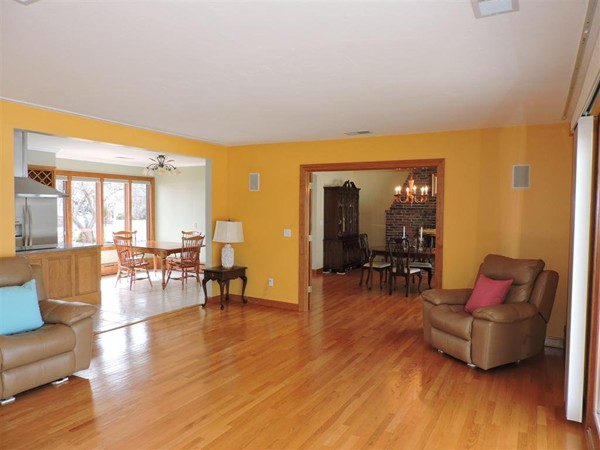 63 Colonial Road Webster, MA 01570 - Photo 20 of 30 a living room with furniture and a wooden floor