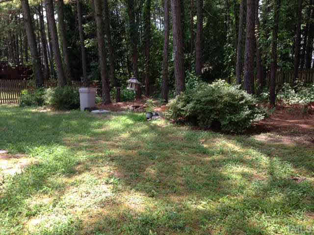 5408 Botany Bay Drive Raleigh, NC 27616 - Photo 3 of 3 a view of a tree in a yard