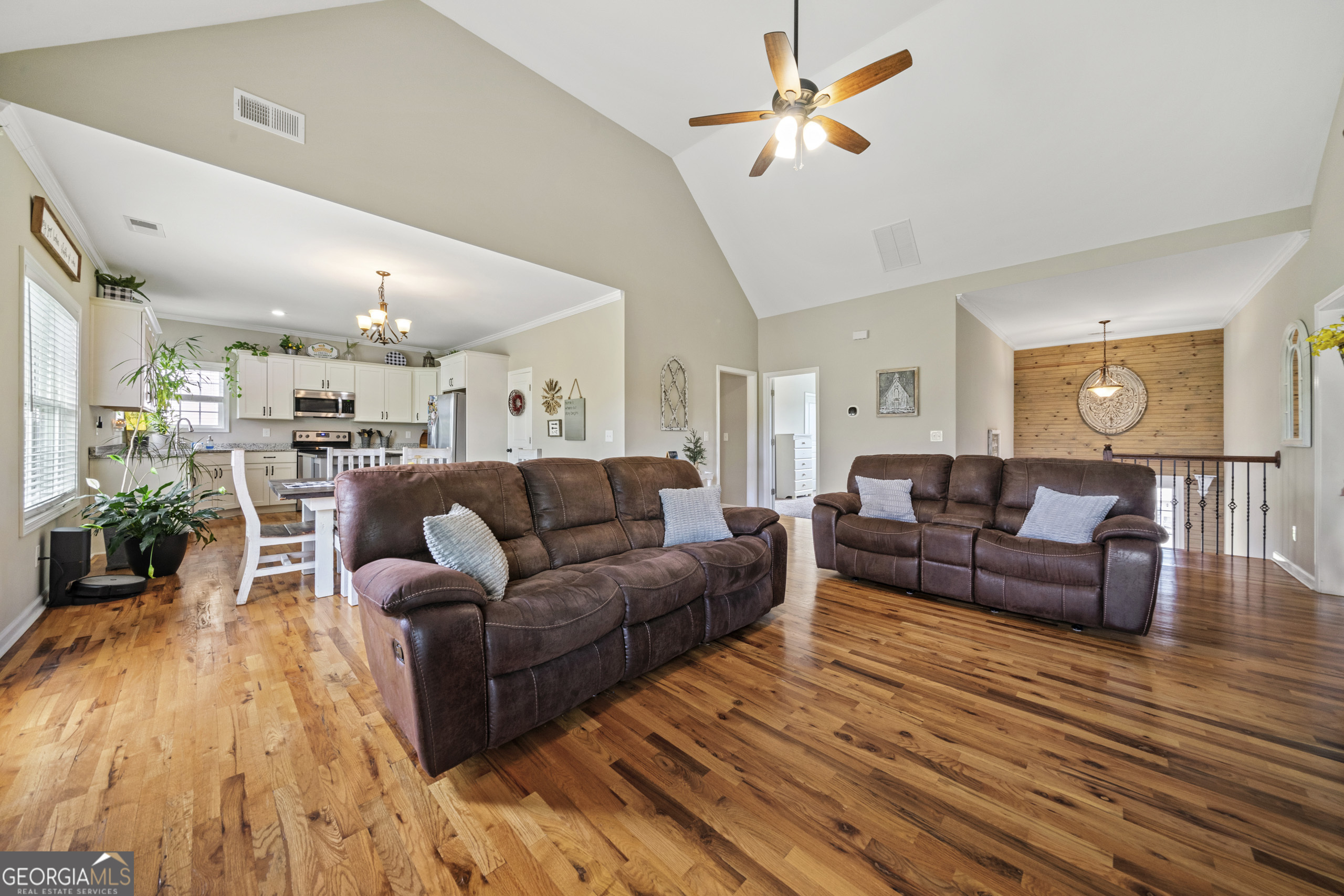 304 Kodiak Road Carrollton, GA 30117 - Photo 12 of 36 a living room with furniture and a view of kitchen