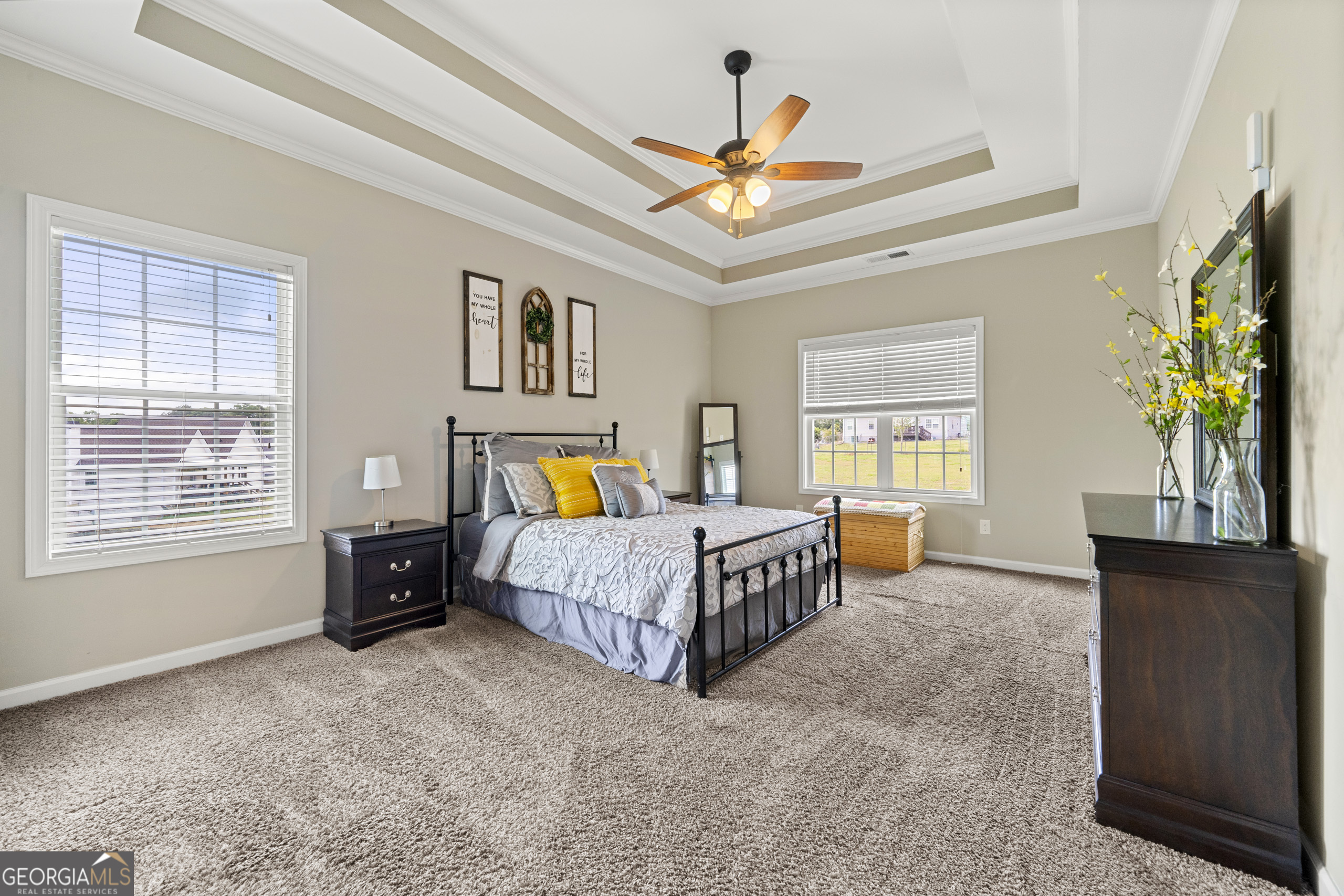 304 Kodiak Road Carrollton, GA 30117 - Photo 21 of 36 a bed room with a bed and a chandelier