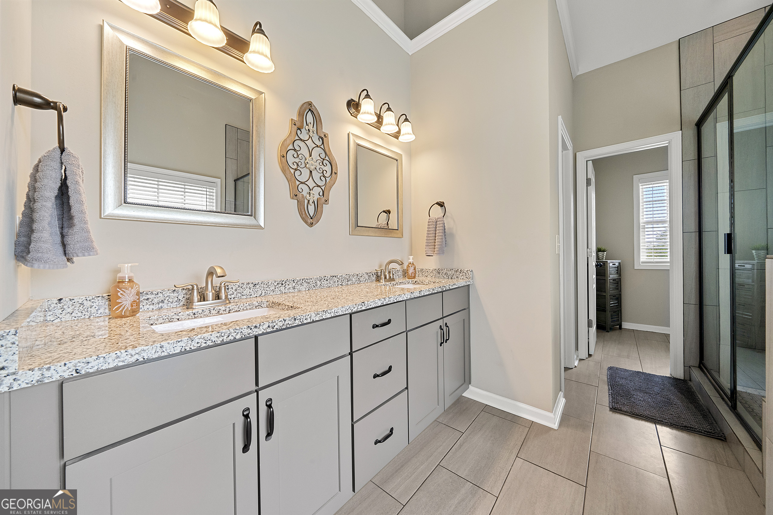304 Kodiak Road Carrollton, GA 30117 - Photo 24 of 36 a bathroom with a granite countertop sink mirror and a