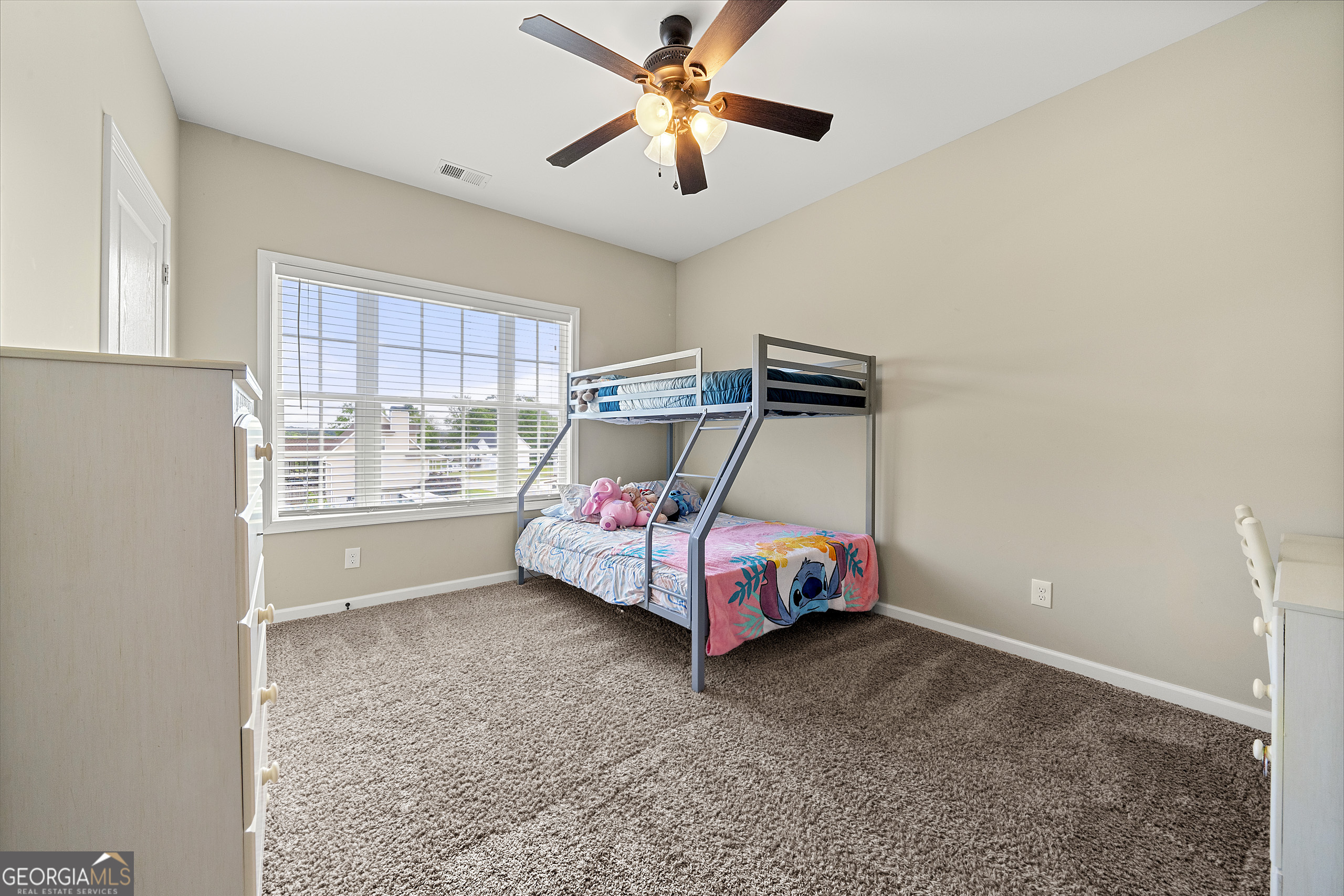 304 Kodiak Road Carrollton, GA 30117 - Photo 25 of 36 a bedroom with bed and window