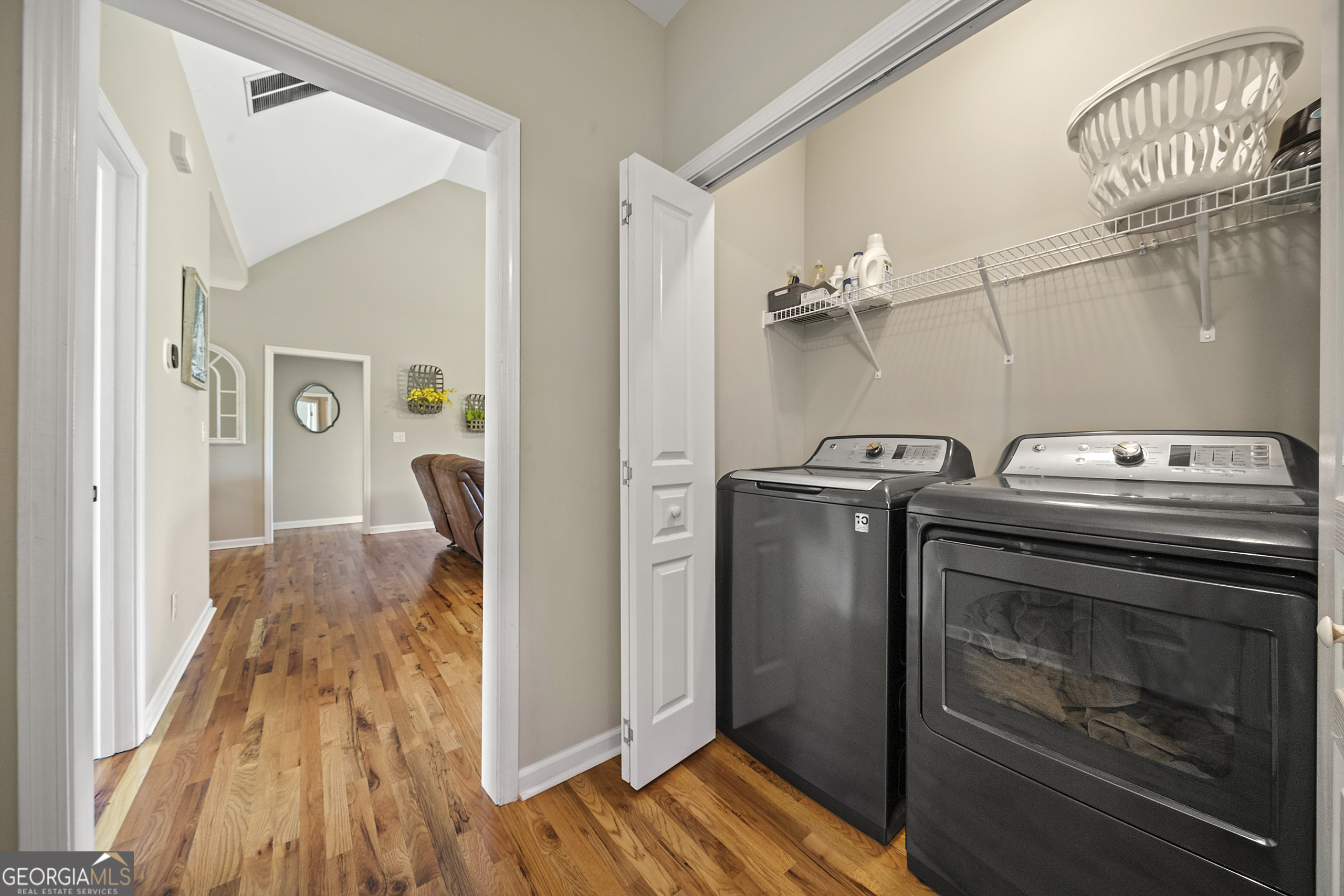 304 Kodiak Road Carrollton, GA 30117 - Photo 30 of 36 a view of a livingroom with wooden floor